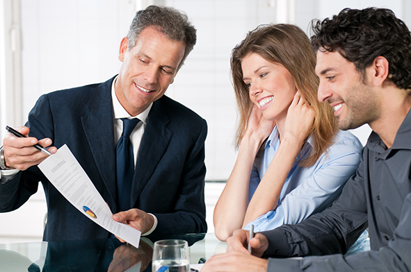 stock-photo-happy-young-couple-discussing-with-a-financial-agent-their-new-investment-105216713