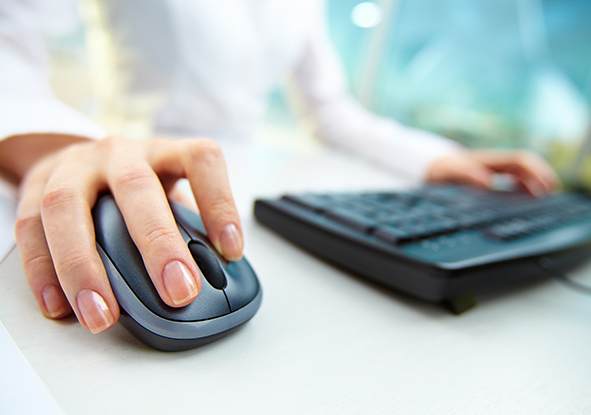 stock-photo-image-of-female-hands-clicking-computer-mouse-97947788